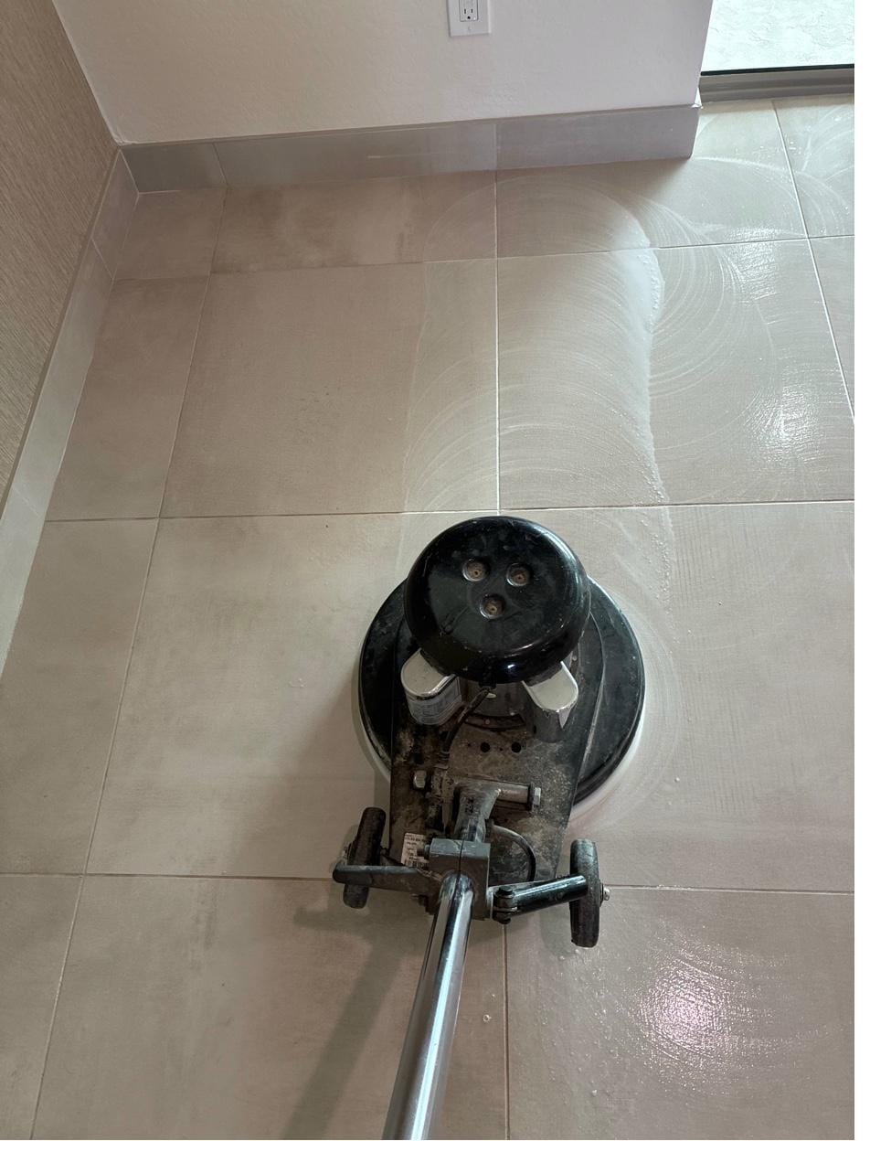 Grout haze removal with a floor machine on new tile