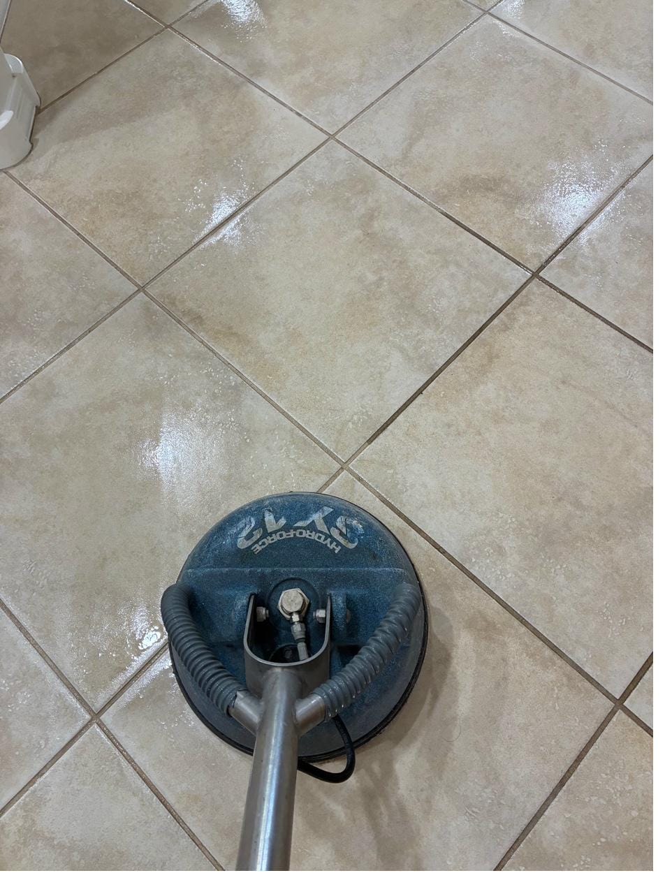 Tile and grout cleaning with a spinner tool