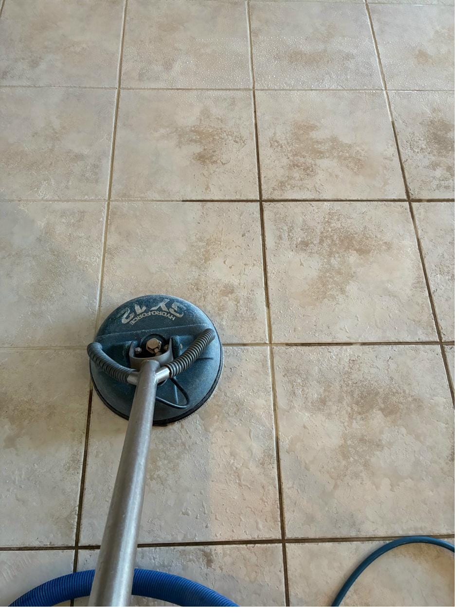 Tile and grout cleaning with a spinner tool