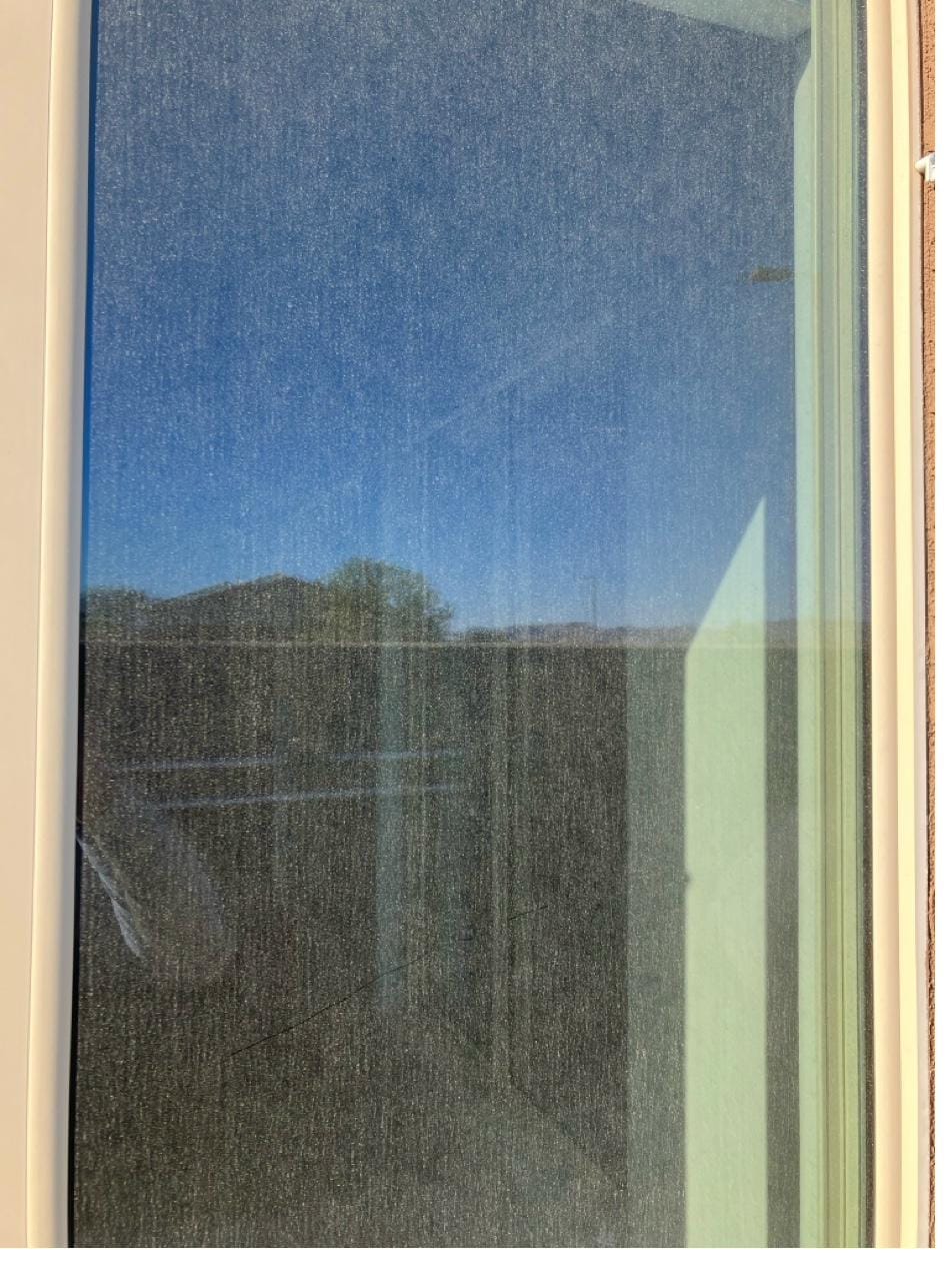 Dusty window before professional cleaning